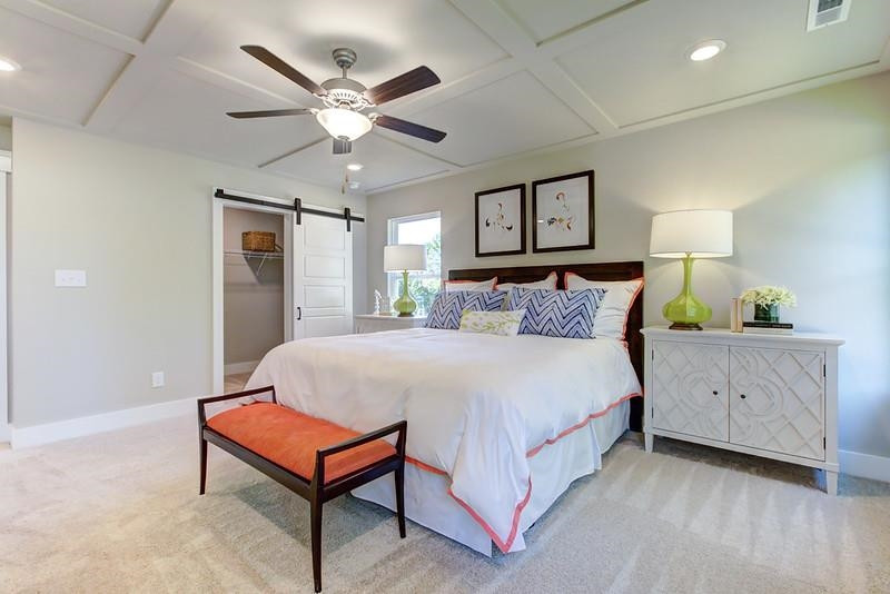 1000 Heartstone Way Durham, NC 27713 - Photo 24 of 35 a spacious bedroom with a bed and window