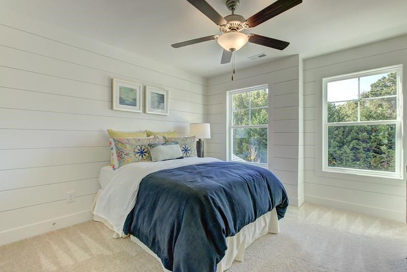 1000 Heartstone Way Durham, NC 27713 - Photo 25 of 35 a bedroom with a large bed and a window