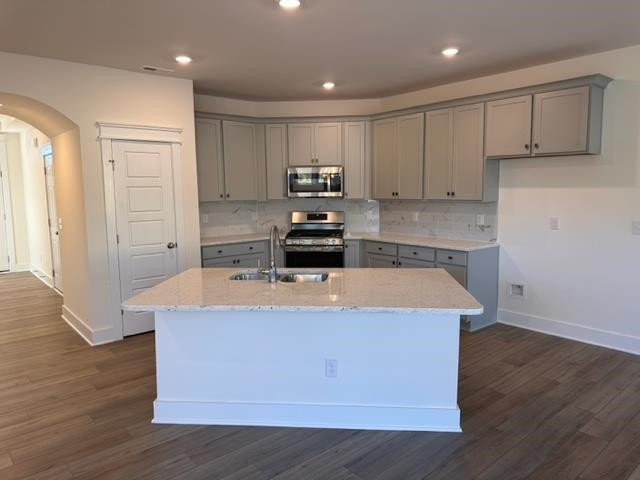 1000 Heartstone Way Durham, NC 27713 - Photo 4 of 35 a view of kitchen with stainless steel appliances granite countertop a stove and a refrigerator