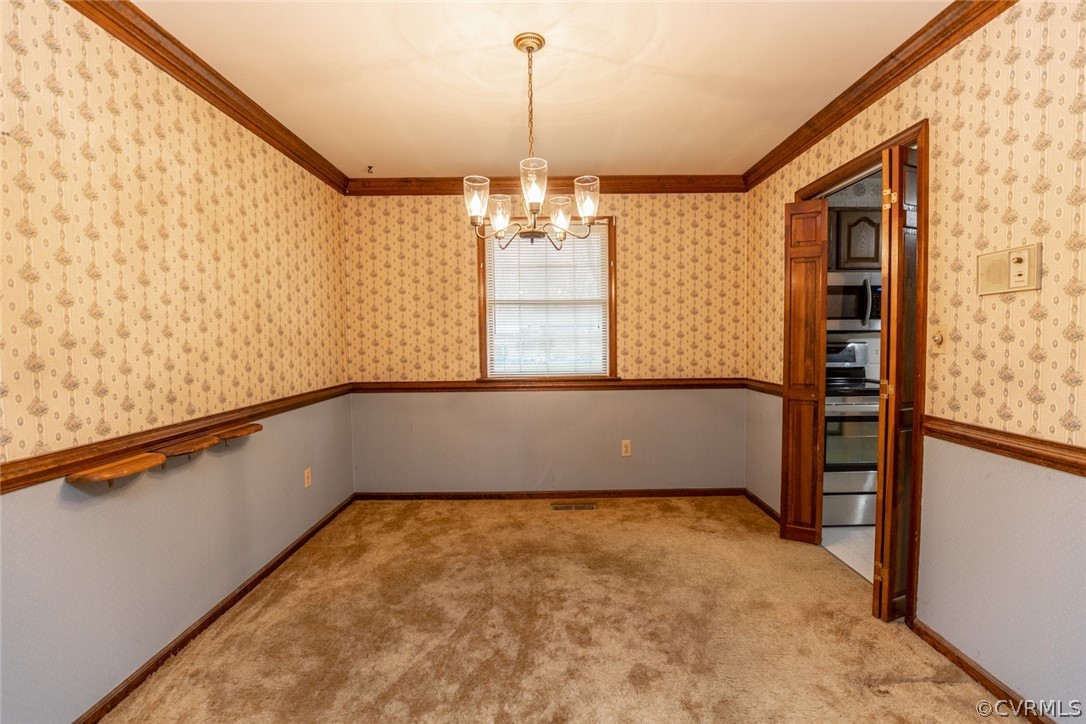 4636 Treely Road Chester, VA 23831 - Photo 17 of 48 a view of a room with window and chandelier