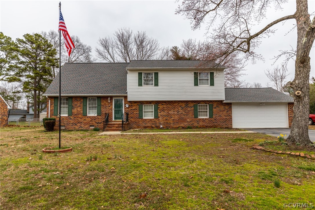 4636 Treely Road Chester, VA 23831 - Photo 2 of 48 a front view of a house with a yard