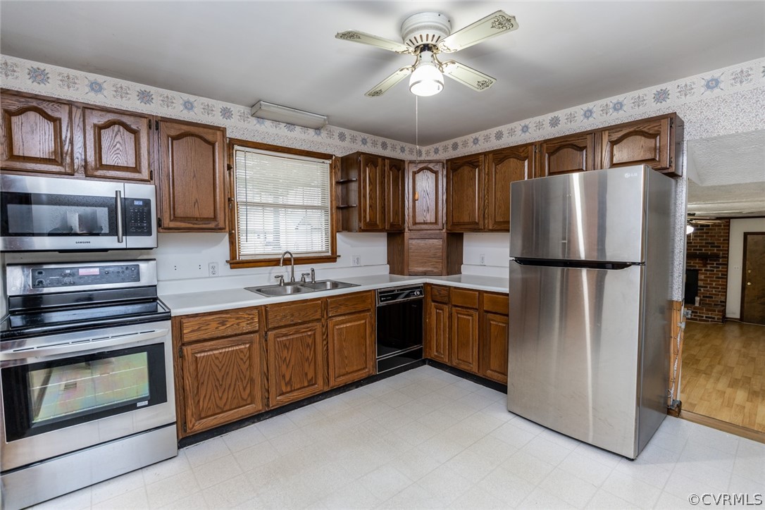 4636 Treely Road Chester, VA 23831 - Photo 21 of 48 a kitchen with stainless steel appliances granite countertop a refrigerator a stove and a sink