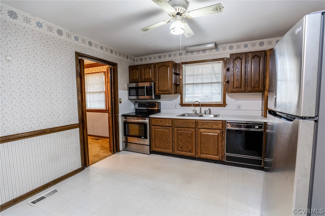 4636 Treely Road Chester, VA 23831 - Photo 23 of 48 a kitchen with stainless steel appliances a refrigerator stove and sink