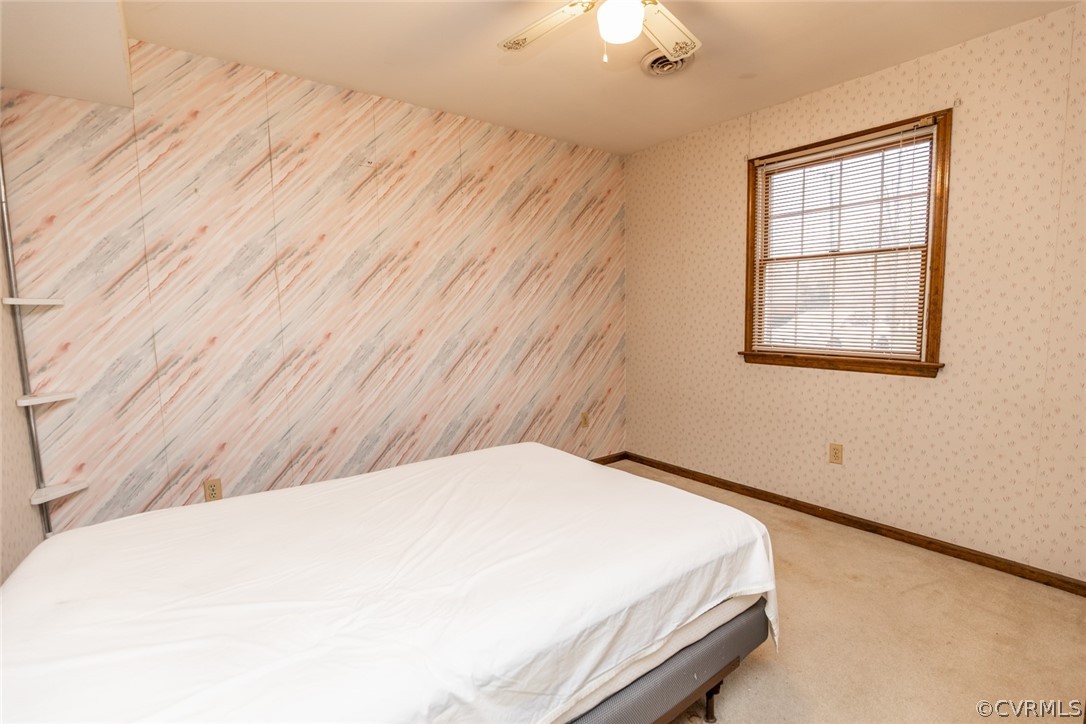 4636 Treely Road Chester, VA 23831 - Photo 29 of 48 a bedroom with a bed and a window