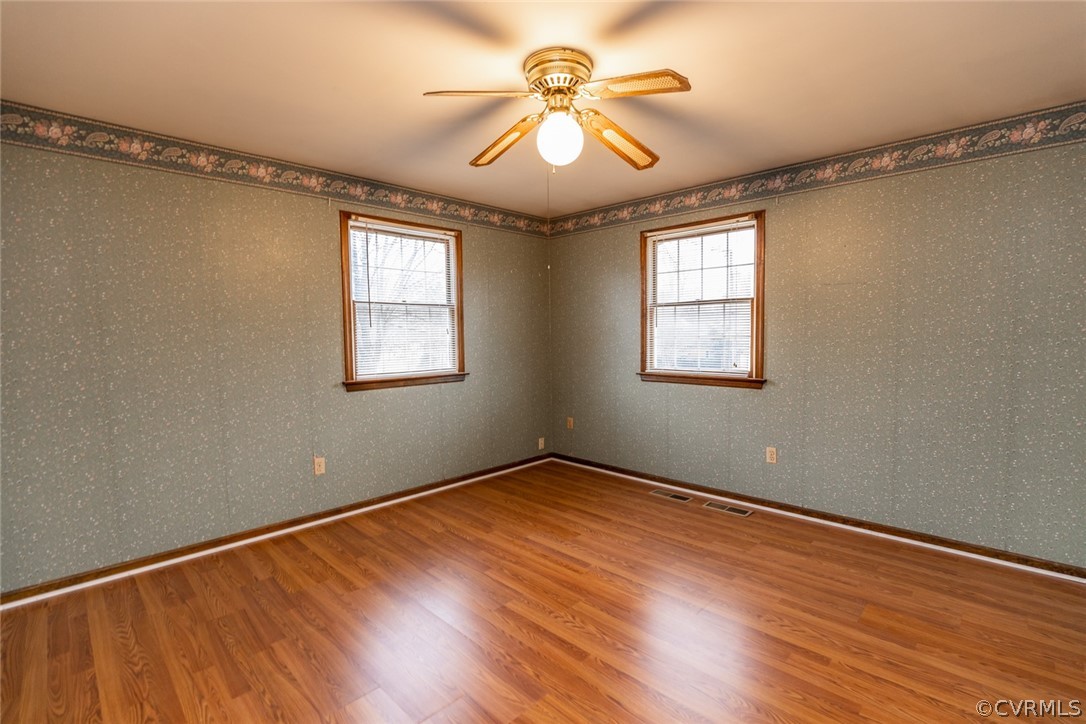 4636 Treely Road Chester, VA 23831 - Photo 36 of 48 wooden floor in an empty room with a window
