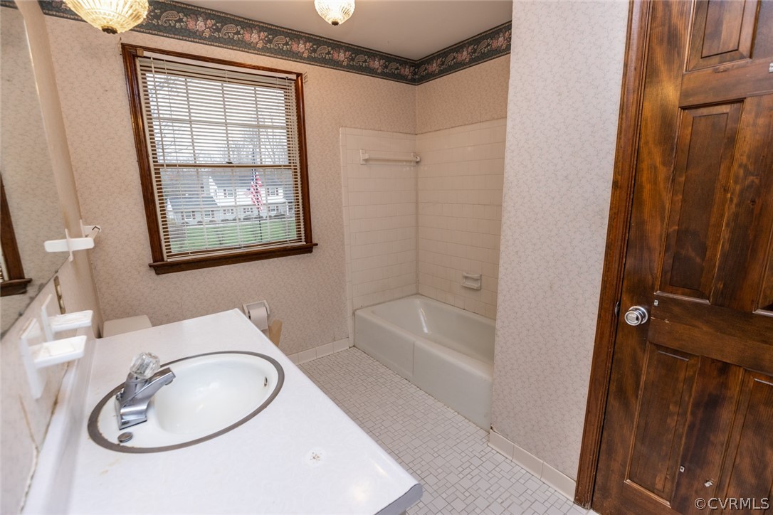 4636 Treely Road Chester, VA 23831 - Photo 41 of 48 a bathroom with a sink toilet and shower