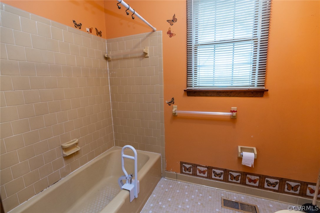 4636 Treely Road Chester, VA 23831 - Photo 45 of 48 a bathroom with a bathtub and a window