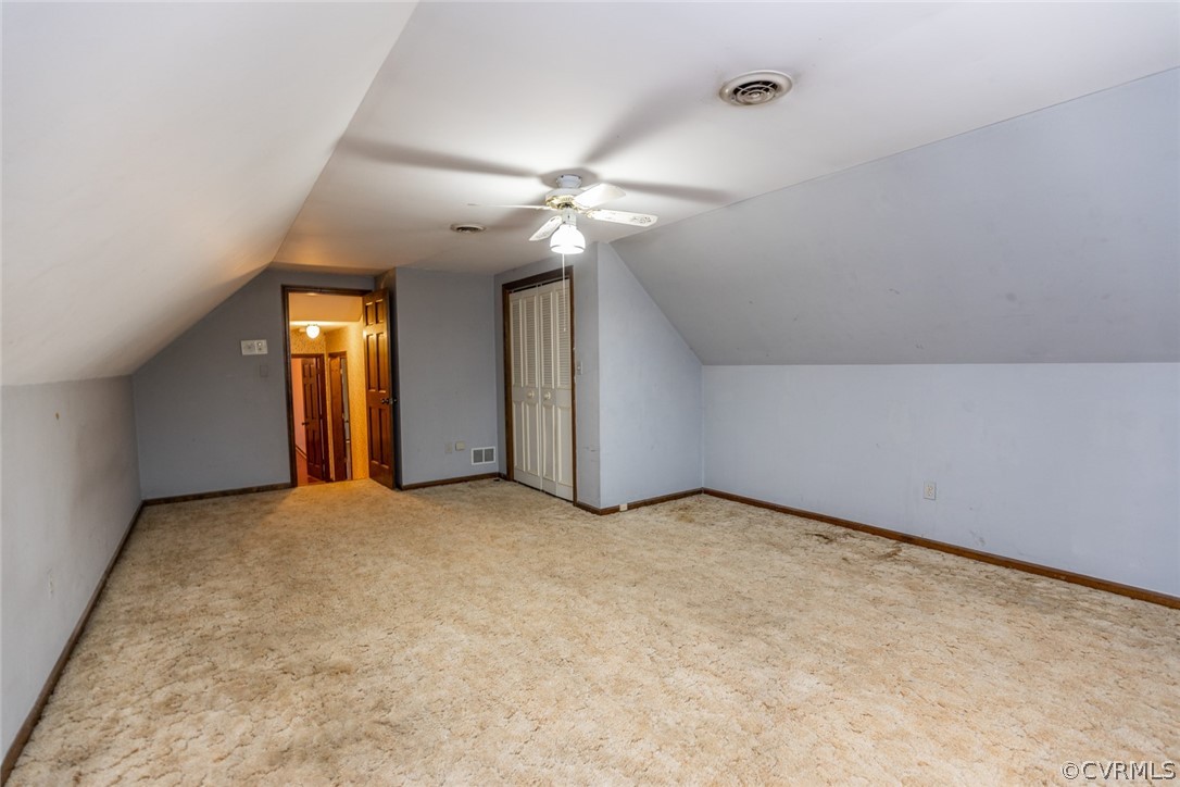 4636 Treely Road Chester, VA 23831 - Photo 47 of 48 an empty room with closet and a chandelier fan