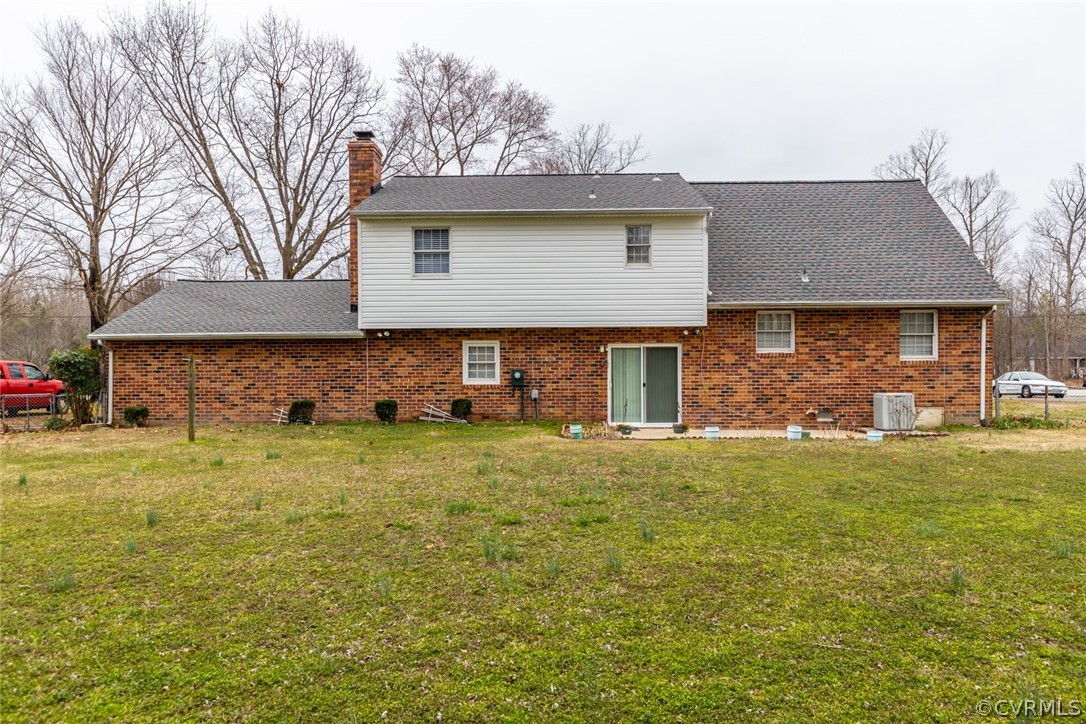 4636 Treely Road Chester, VA 23831 - Photo 7 of 48 a front view of a house with a garden