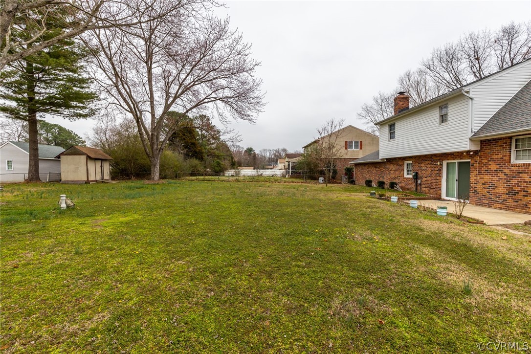 4636 Treely Road Chester, VA 23831 - Photo 10 of 48 a view of a house with a yard