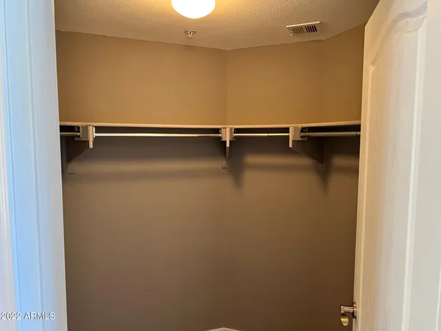 a bathroom with a shower and a tub