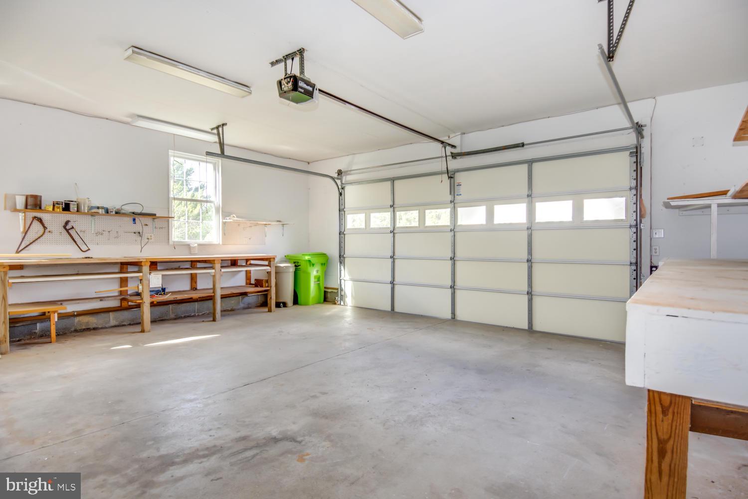 108 Ruthsburg Drive Centreville, MD 21617 - Photo 28 of 39 GARAGE WITH MULTIPLE WORK BENCHES