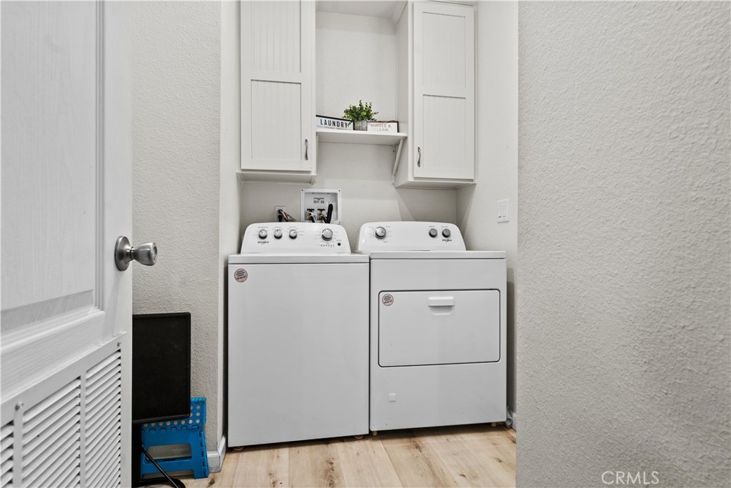 7101 Rosecrans Avenue, Unit 137 Paramount, CA 90723 - Photo 17 of 30 a utility room with dryer and washer