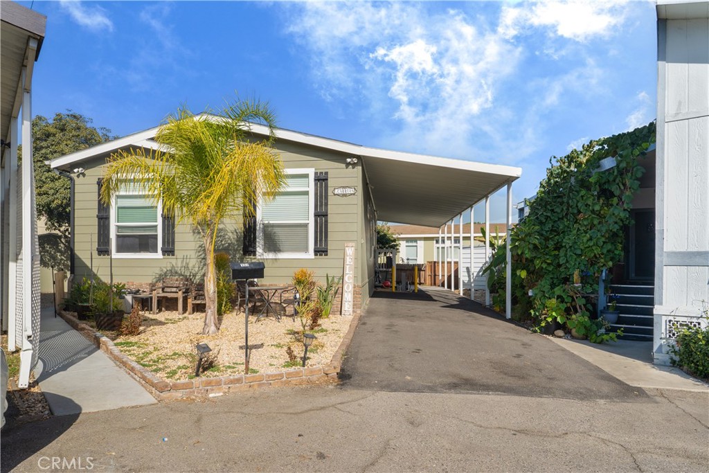 7101 Rosecrans Avenue, Unit 137 Paramount, CA 90723 - Photo 18 of 30 a view of a house with a patio