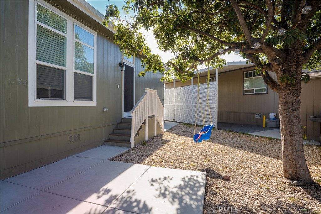 7101 Rosecrans Avenue, Unit 137 Paramount, CA 90723 - Photo 20 of 30 a sign that is sitting in front of a house