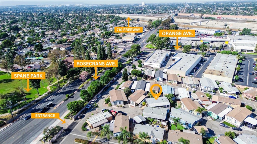 7101 Rosecrans Avenue, Unit 137 Paramount, CA 90723 - Photo 27 of 30 an aerial view of residential houses with outdoor space and swimming pool