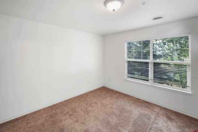 a view of a room with an empty space