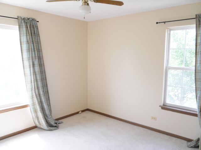 1303 Providence Circle, Unit 1303 Elgin, IL 60120 - Photo 12 of 16 an empty room with a window