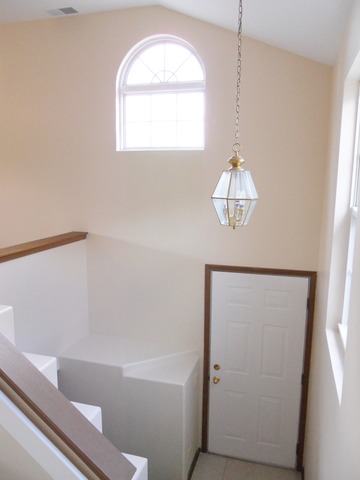1303 Providence Circle, Unit 1303 Elgin, IL 60120 - Photo 3 of 16 a bathroom with a bathtub and a window