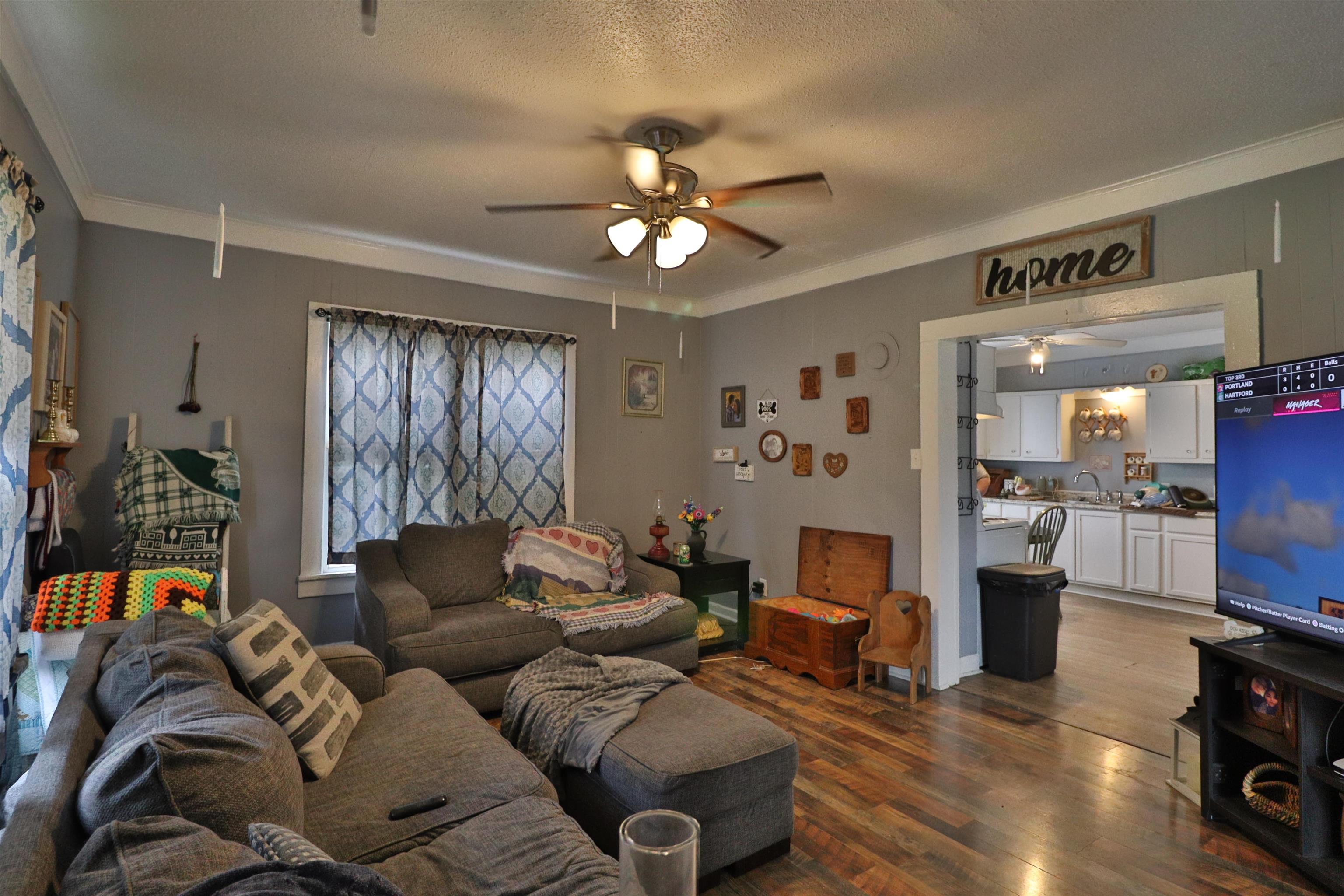 278 Ford Store Road Ripley, TN 38063 - Photo 5 of 26 a living room with furniture and a fireplace