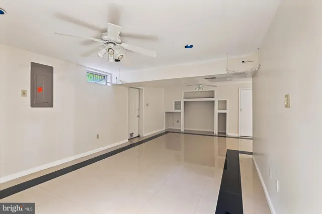 a view of a hardwood floor in a room