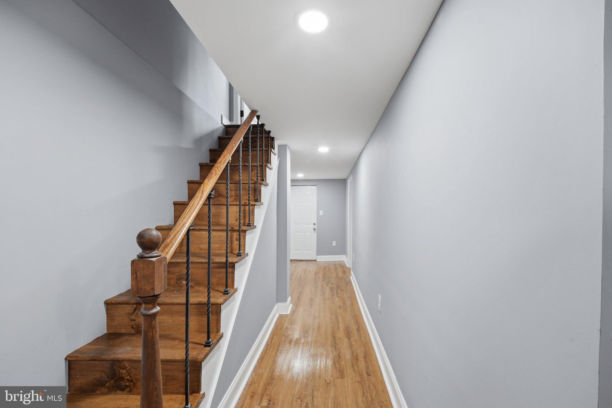 914 5th Street Northeast Washington, DC 20002 - Photo 15 of 36 Inviting hallway with elegant staircase.