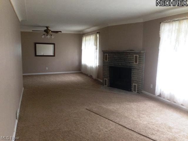 9809 Johnnycake Ridge Road Mentor, OH 44060 - Photo 5 of 18 Freshly painted and newer carpet throughout this ranch home. A brick gas fireplace too