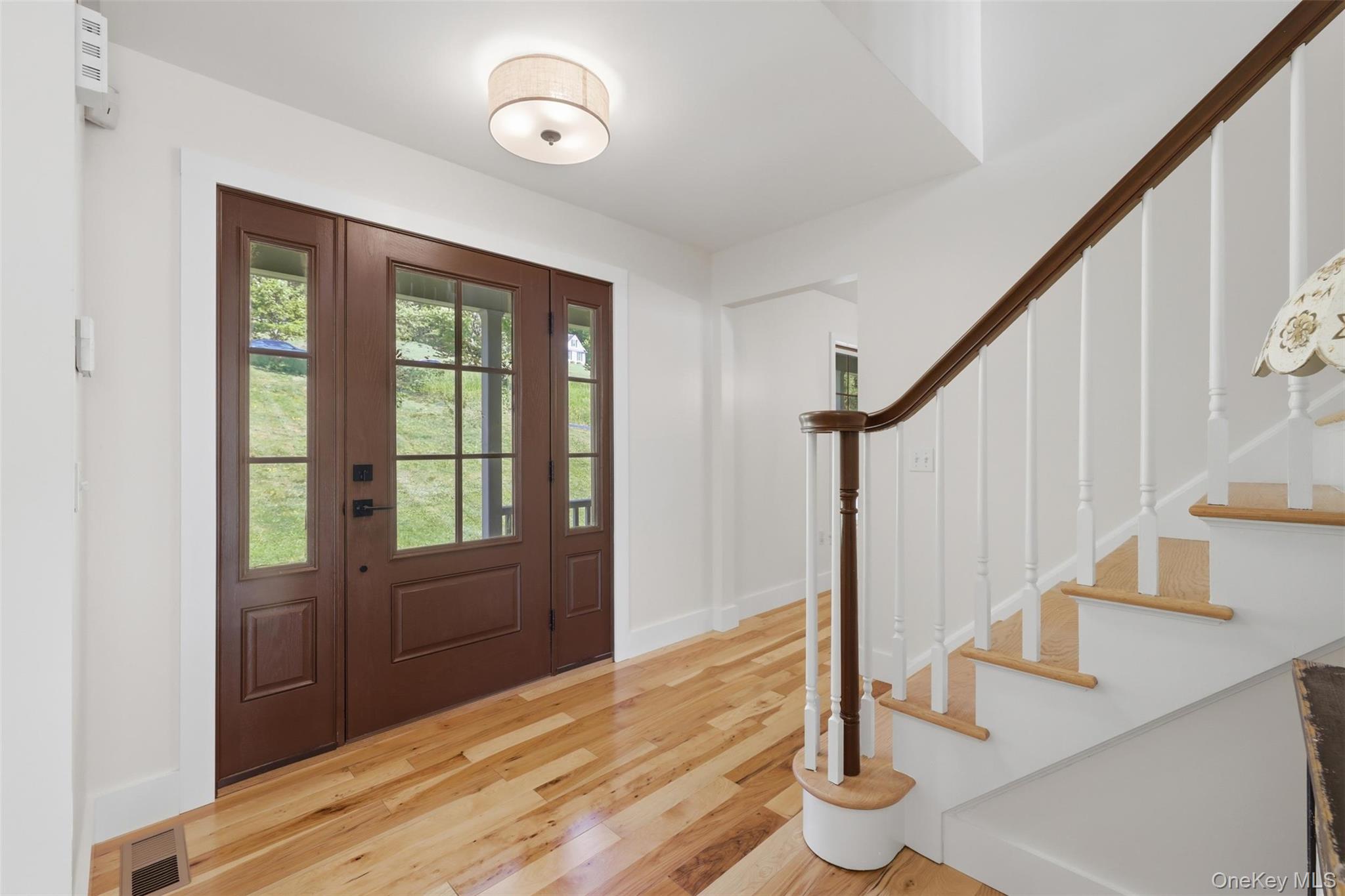 233 Devon Farms Road Stormville, NY 12582 - Photo 5 of 48 a view of entryway with wooden floor and door