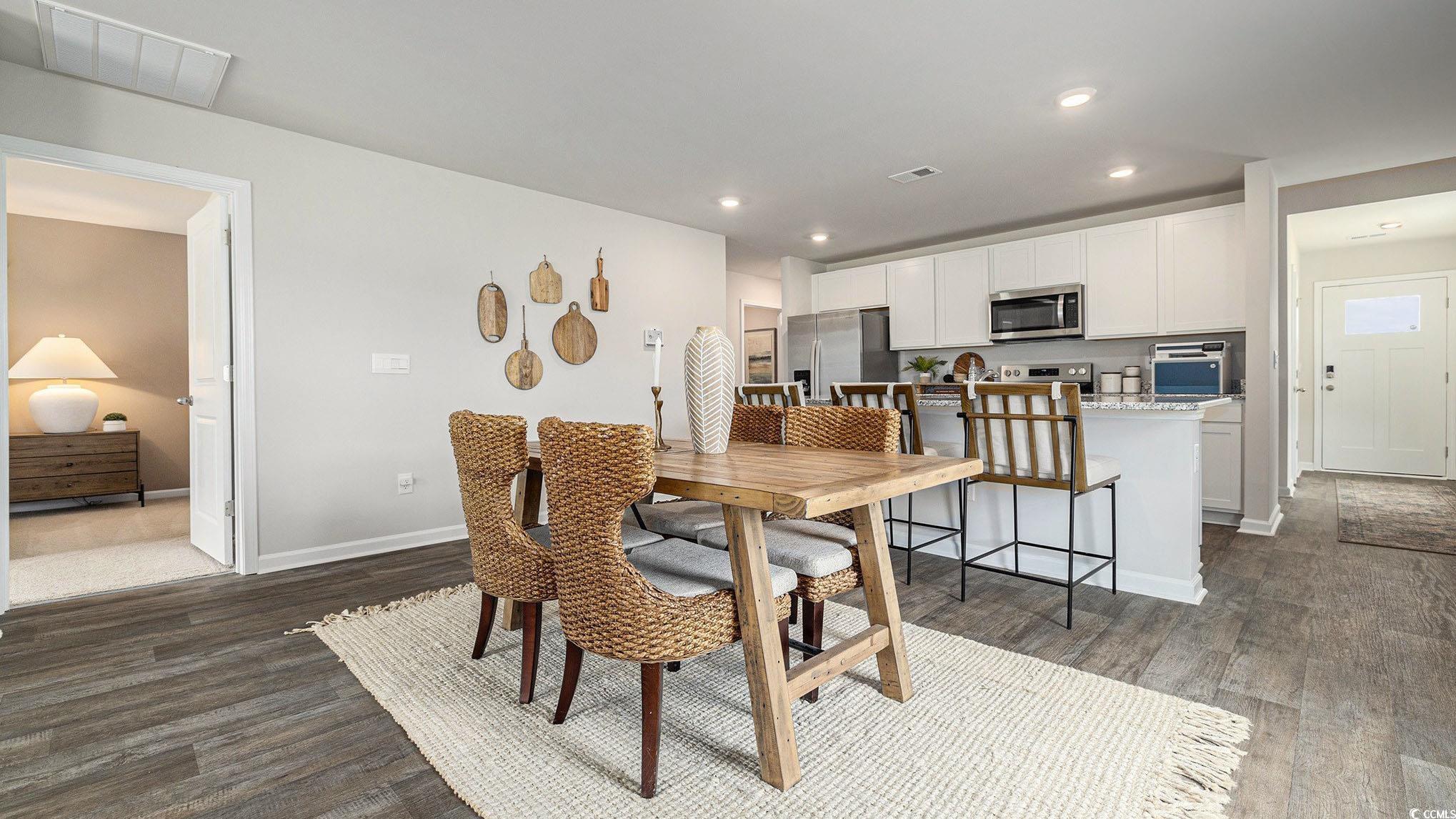 3579 Ashridge Way Conway, SC 29526 - Photo 8 of 27 Dining space with dark wood-style floors, recessed lighting, and baseboards