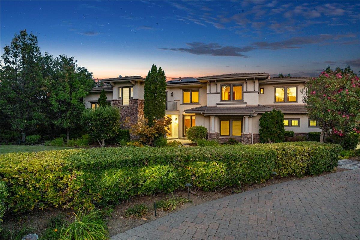 20040 Spaich Court Saratoga, CA 95070 - Photo 11 of 87 a front view of a residential apartment building with a yard