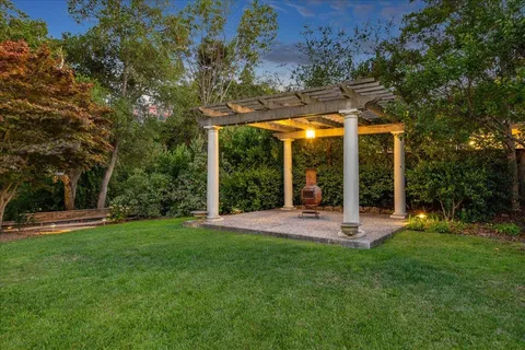 a view of a hallway with a livingroom and a couch