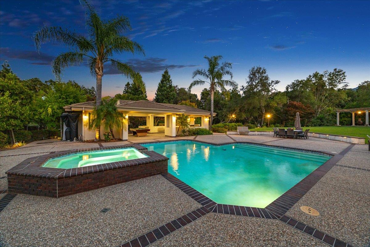 20040 Spaich Court Saratoga, CA 95070 - Photo 17 of 87 a view of a swimming pool with a patio