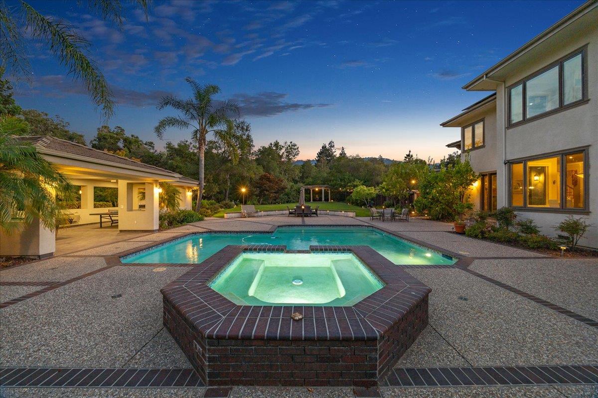 20040 Spaich Court Saratoga, CA 95070 - Photo 18 of 87 a view of a swimming pool with a patio