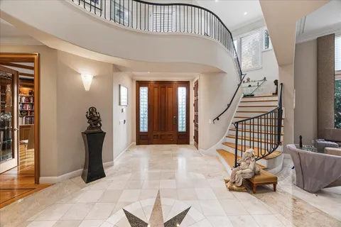 a bedroom with a bed and a fireplace