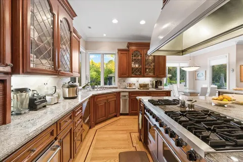 a bedroom with a bed and a table in it