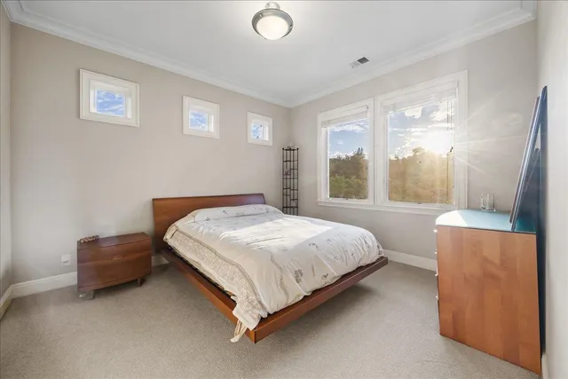 an aerial view of a house with yard swimming pool and outdoor seating
