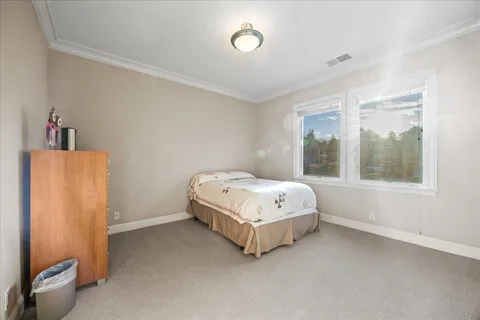 an aerial view of a house with a garden