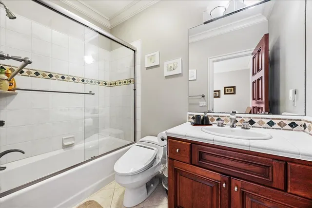 a front view of a house with sitting area and swimming pool