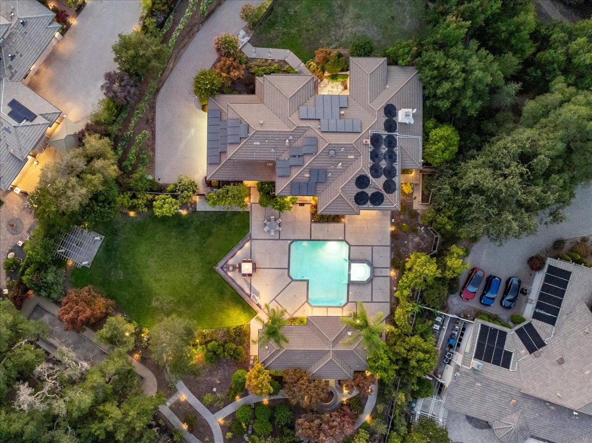 20040 Spaich Court Saratoga, CA 95070 - Photo 6 of 87 an aerial view of a house with a garden and swimming pool