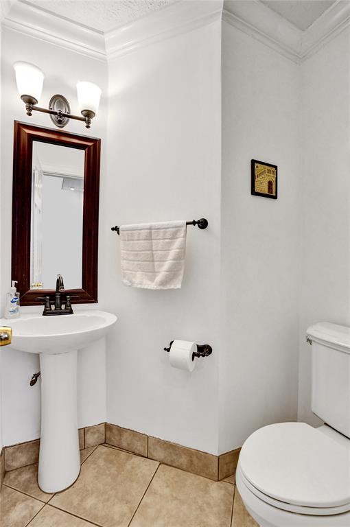 1415 Miami Road, Unit B Fort Lauderdale, FL 33316 - Photo 11 of 59 a bathroom with a sink a toilet and mirror