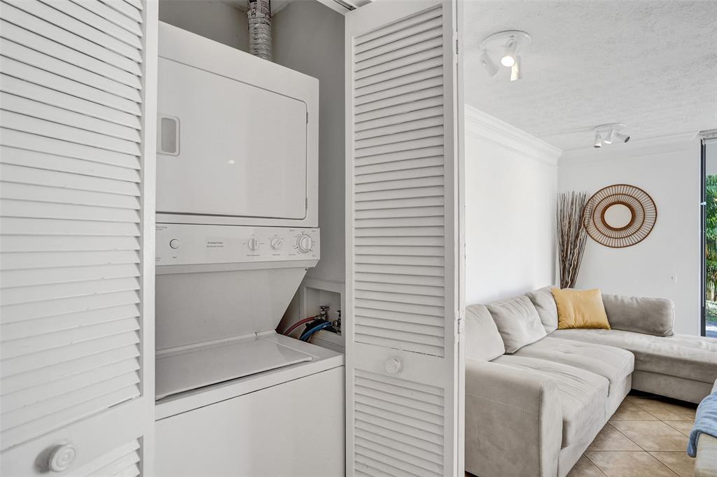 1415 Miami Road, Unit B Fort Lauderdale, FL 33316 - Photo 20 of 59 a utility room with dryer and washer