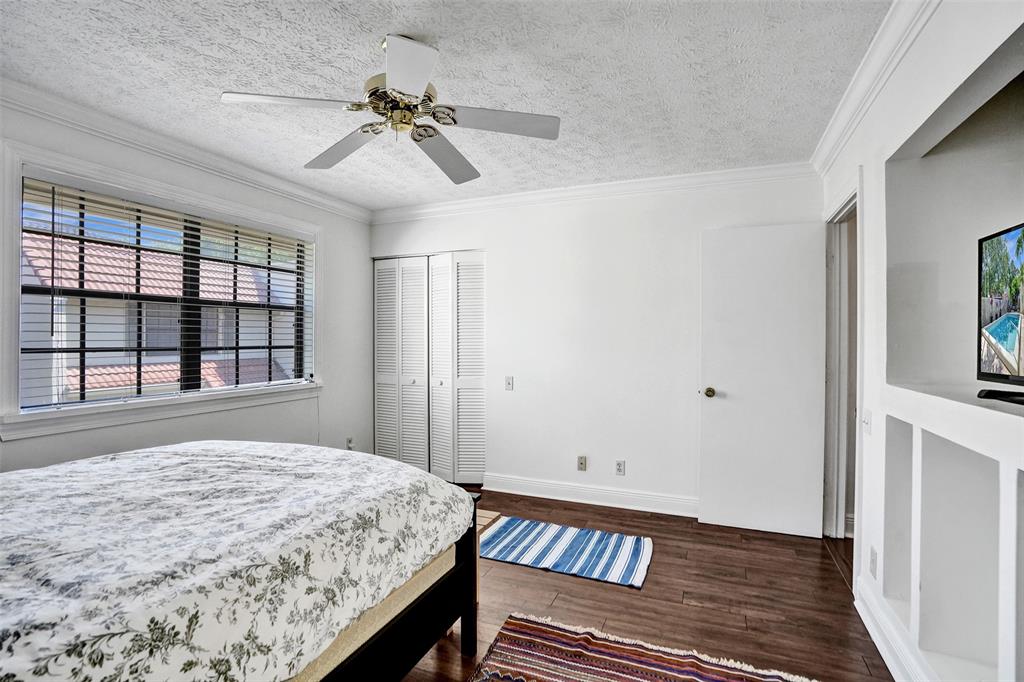 1415 Miami Road, Unit B Fort Lauderdale, FL 33316 - Photo 28 of 59 a bedroom with a bed and a window