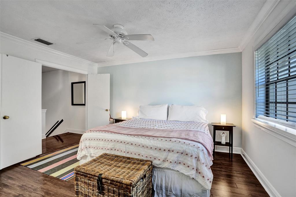 1415 Miami Road, Unit B Fort Lauderdale, FL 33316 - Photo 33 of 59 a bedroom with a bed and wooden floor