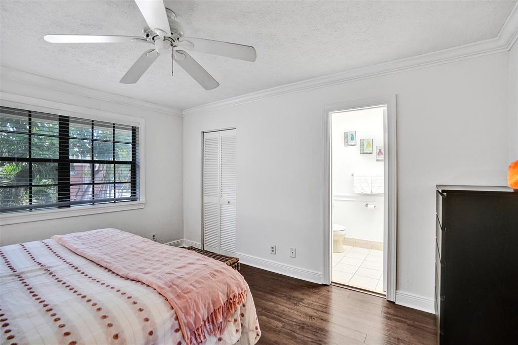 1415 Miami Road, Unit B Fort Lauderdale, FL 33316 - Photo 37 of 59 a bedroom with a bed and a window