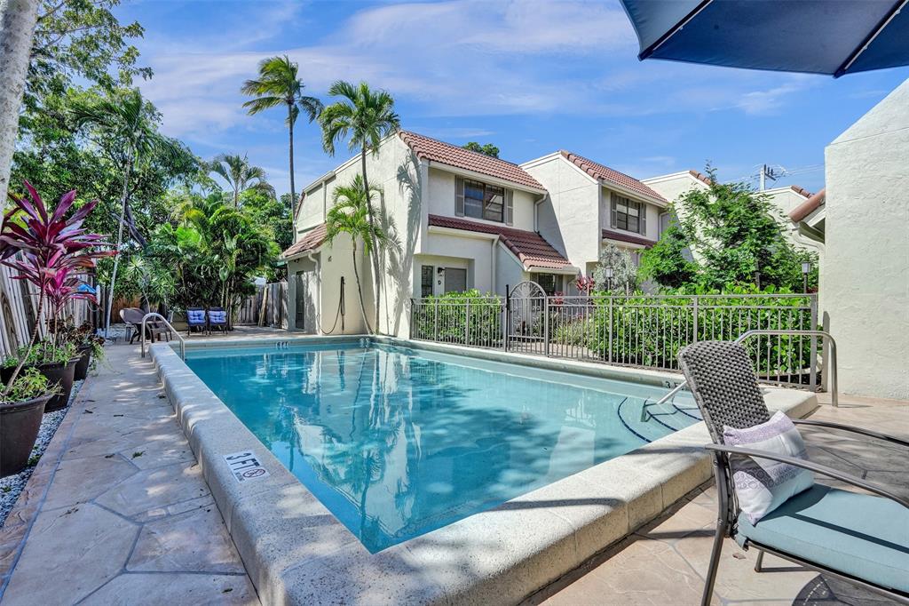 1415 Miami Road, Unit B Fort Lauderdale, FL 33316 - Photo 48 of 59 a view of a swimming pool with a patio