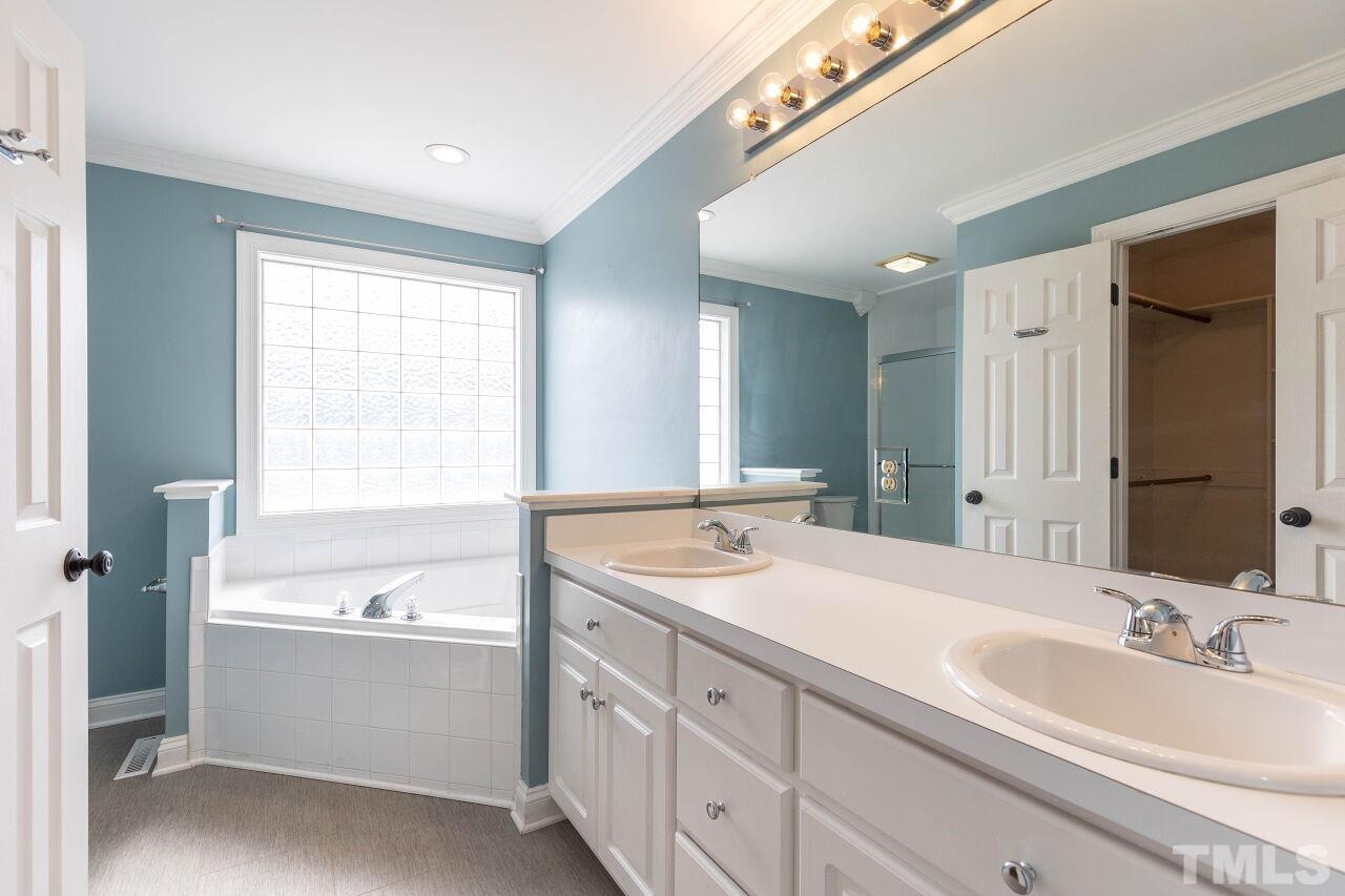 6573 Madison Road Bailey, NC 27807 - Photo 13 of 31 a bathroom with a sink and a bathtub