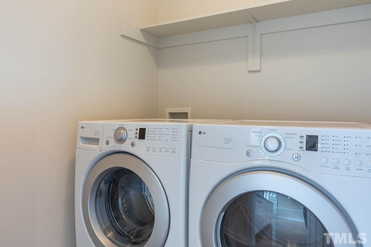 6573 Madison Road Bailey, NC 27807 - Photo 18 of 31 a utility room with dryer and washer