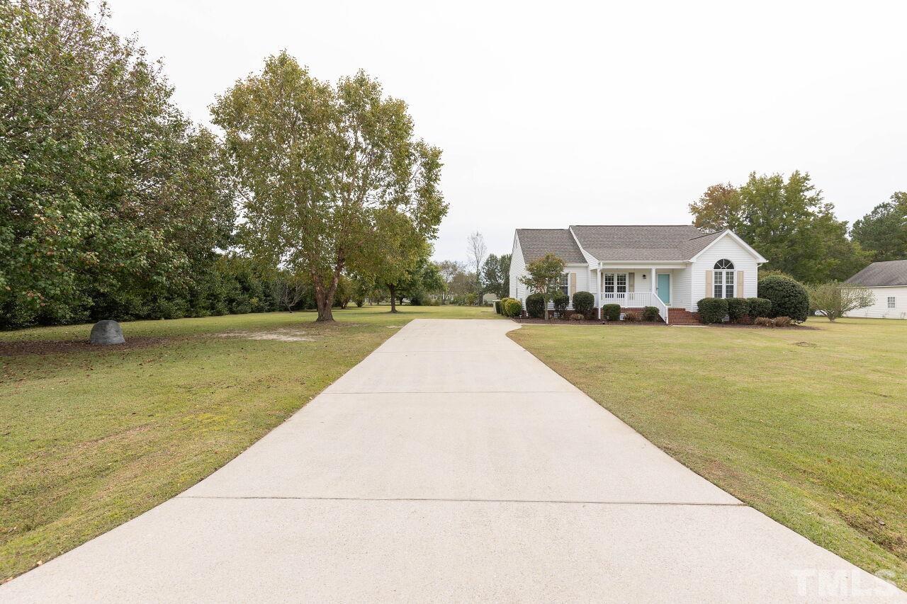 6573 Madison Road Bailey, NC 27807 - Photo 2 of 31 a view of swimming pool with trees