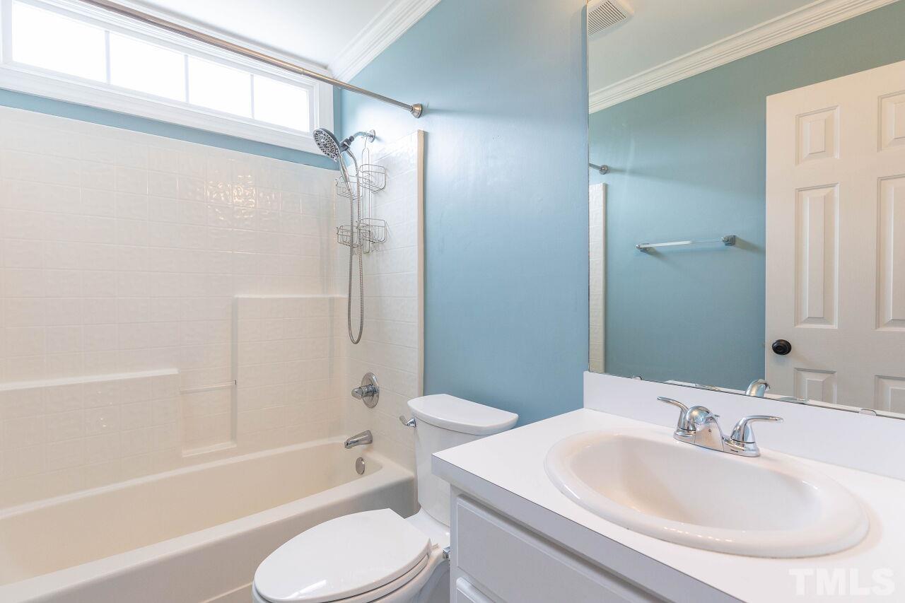 6573 Madison Road Bailey, NC 27807 - Photo 21 of 31 a bathroom with a sink toilet and shower
