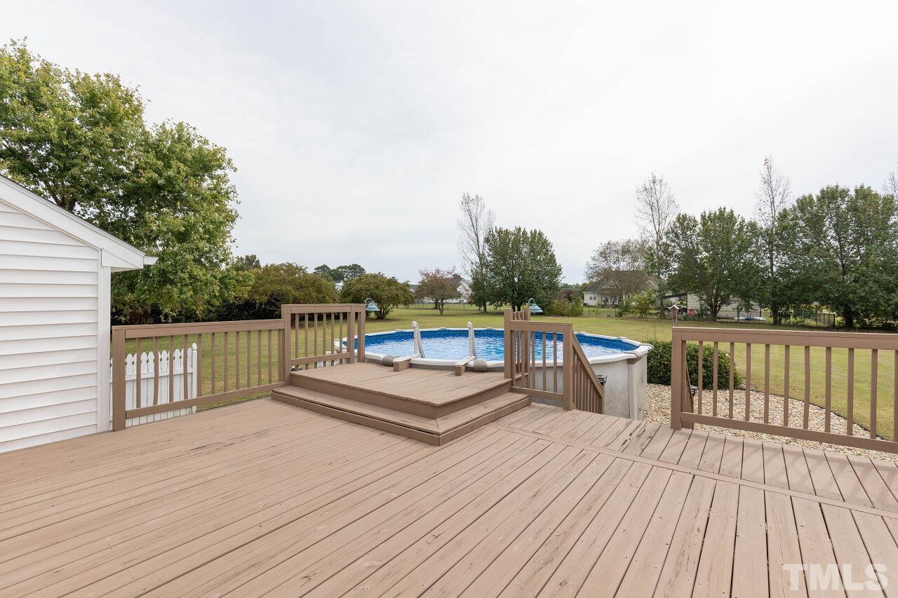 6573 Madison Road Bailey, NC 27807 - Photo 25 of 31 a view of balcony with deck and wooden floor